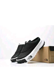 THE NORTH. FACE. NEVER STOP MULE BLACK WHITE