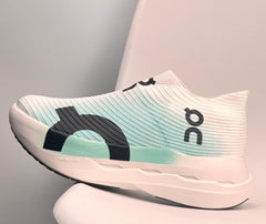 On Cloudboom Strike LS White and Mint Green
